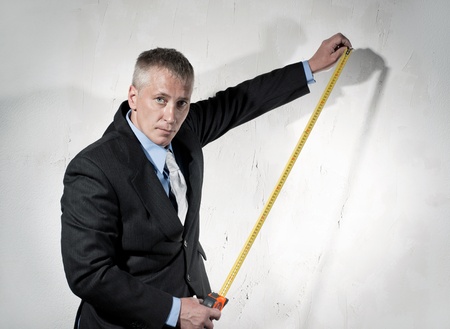 Construction Director with tape measureの写真素材