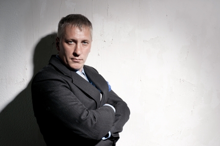 Portrait of businessman in a black suitの写真素材