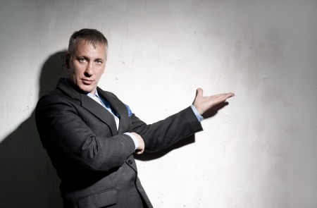 Portrait of businessman in a black suitの写真素材