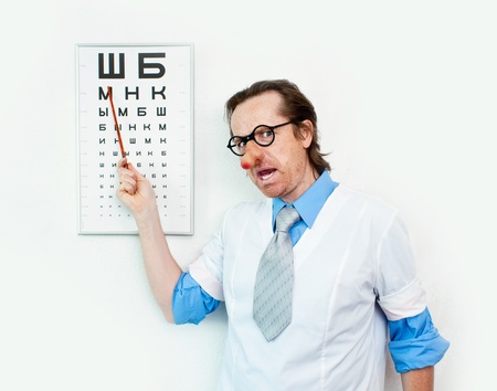 Funny oculist in the white coatの写真素材