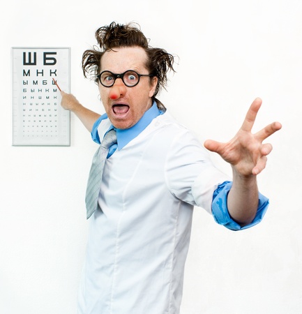 Crazy oculist in the white coatの写真素材