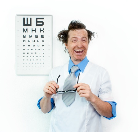 Funny oculist with eyes closedの写真素材