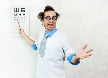 Crazy oculist with disheveled hairの写真素材