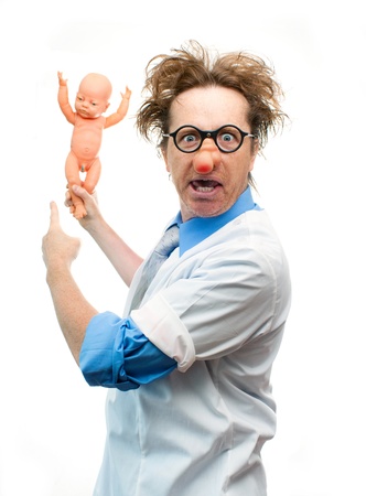 Crazy pediatrician holding a babyの写真素材