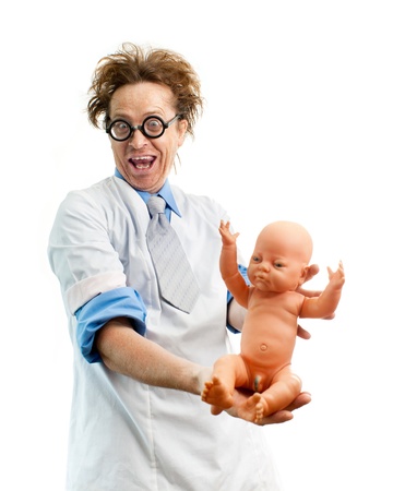 Funny pediatrician holding a babyの写真素材