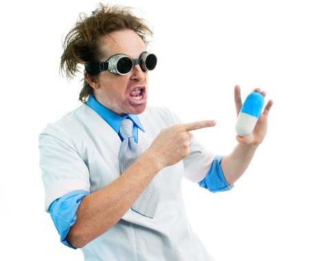 Funny doctor holding a pillの写真素材
