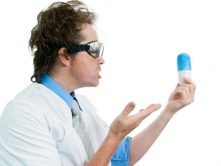 Funny doctor holding a pillの写真素材