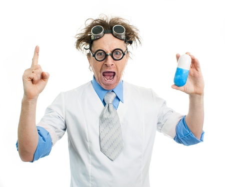 Funny doctor holding a pillの写真素材