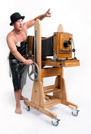 Funny photographer with retro cameraの写真素材