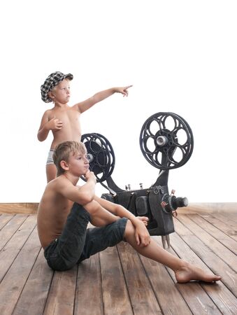 Two boys can see a interesting movieの写真素材