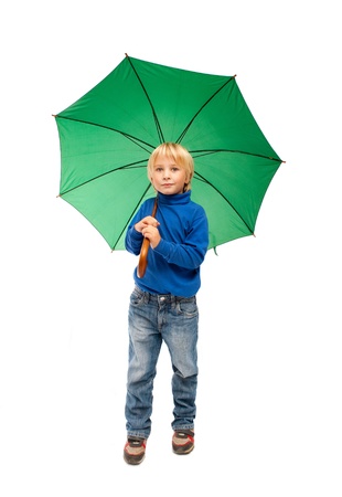 Little boy with green umbrellaの写真素材
