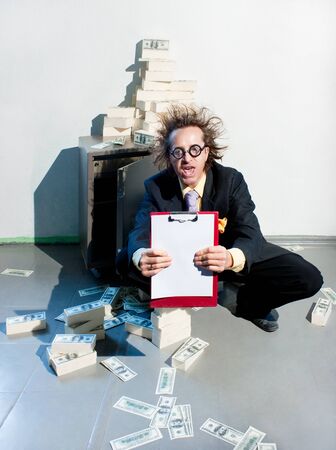Crazy banker with bunch of moneyの写真素材