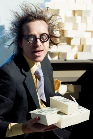 Greedy banker with bunch of moneyの写真素材