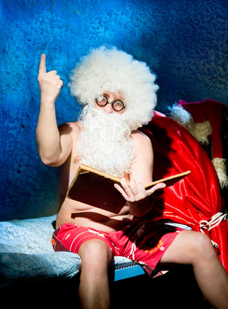 Santa Claus is preparing for Christmasの写真素材