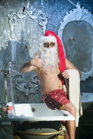 Santa Claus after taking a bathの写真素材