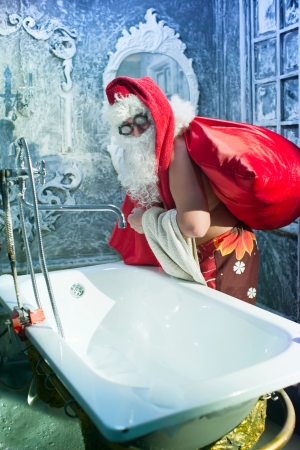 Santa Claus after taking a bathの写真素材