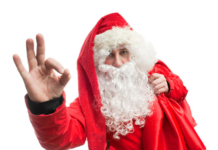 Santa Claus in a red blazer  with a sackの写真素材