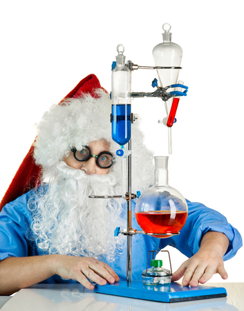 Santa Claus is in the laboratory with flasksの写真素材