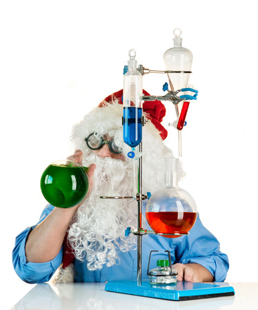 Santa Claus is in the laboratory with flasksの写真素材