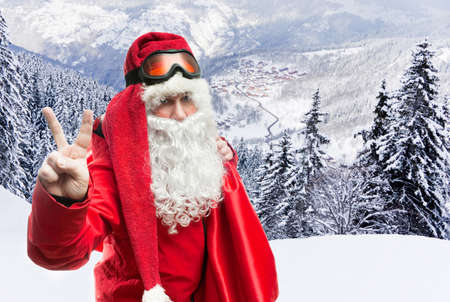 Santa Claus with the sack of gifts in the forestの写真素材