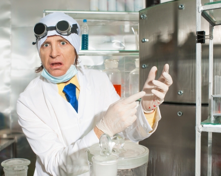 Crazy chemist puts science experiment in laboratoryの写真素材