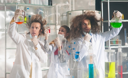 Crazy chemists conduct a scientific experiment in a laboratoryの写真素材