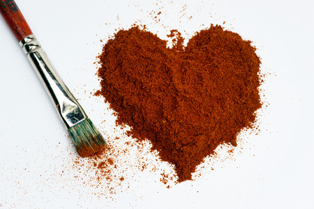 Heart of pepper on a white backgroundの写真素材
