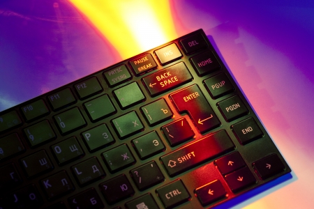 Closeup of a computer keyboard with beautiful lightingの写真素材