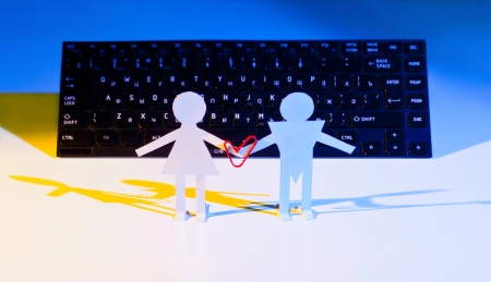 Friendly relations people through computerの写真素材