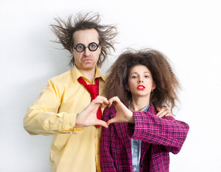 Bizarre pair of lovers in funny clothesの写真素材
