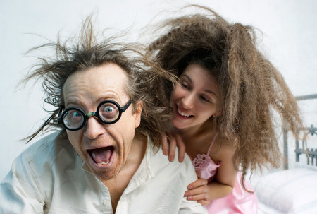 Amusing portrait of happy spousesの写真素材