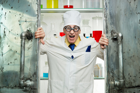 Crazy chemist opens the door to the labの写真素材