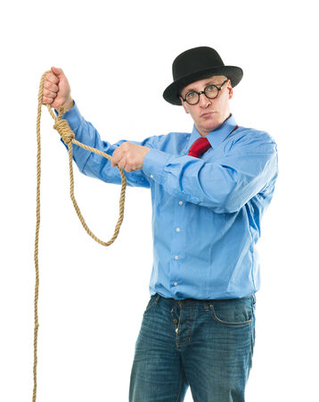Unhappy man with a rope in his handsの写真素材