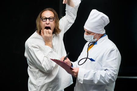 Conversation between doctor and patientの写真素材