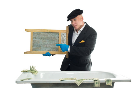 Man money launderers in the bathの写真素材