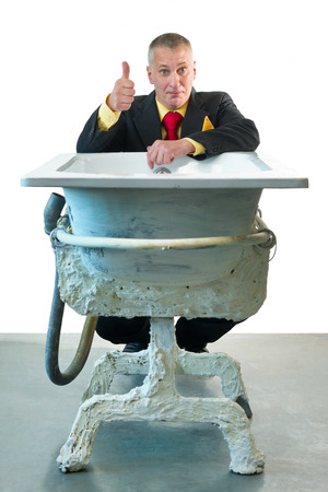 Man in suit with art bathの写真素材