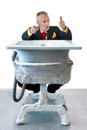Man in suit with art bathの写真素材