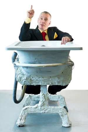 Man in suit with art bathの写真素材