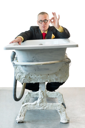 Man in suit with art bathの写真素材