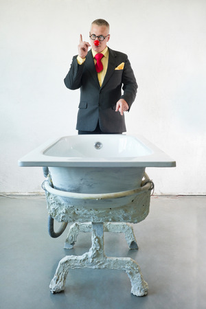 Man in suit with art bathの写真素材