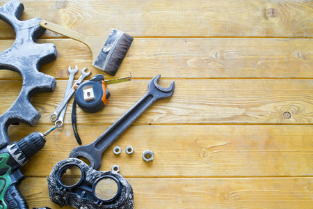 Set of bench tools on the wooden backgroundの写真素材