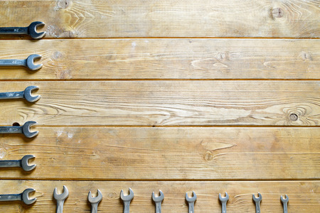 Set of wrenches on the wooden backgroundの写真素材