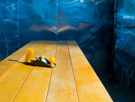 Shaving plane is on the tableの写真素材