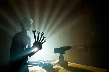 Young metalworker at work in the workshopの写真素材