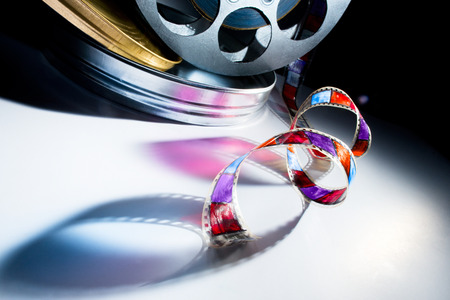 Reel of film on a color backgroundの写真素材