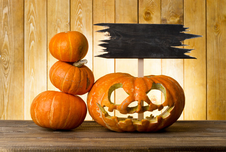 Halloween pumpkin on the wood tableの写真素材