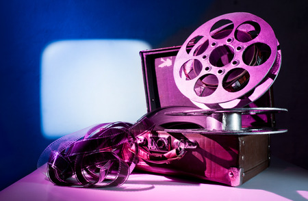 Old reel of film on a suitcaseの写真素材