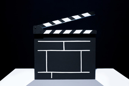 Cinema clapper on the black backgroundの写真素材