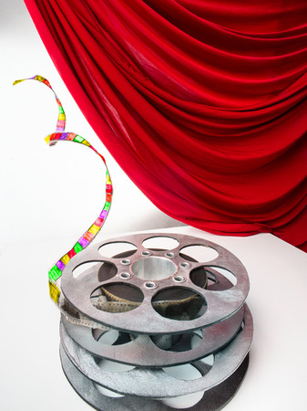 Reel of film and red curtainの写真素材