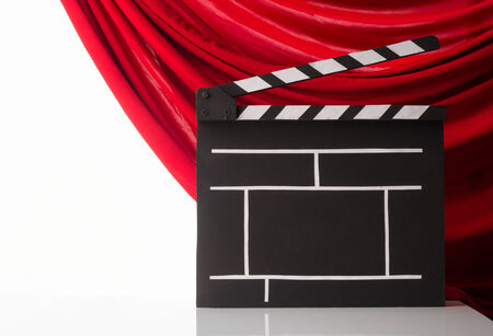 Cinema clapper and red curtainの写真素材
